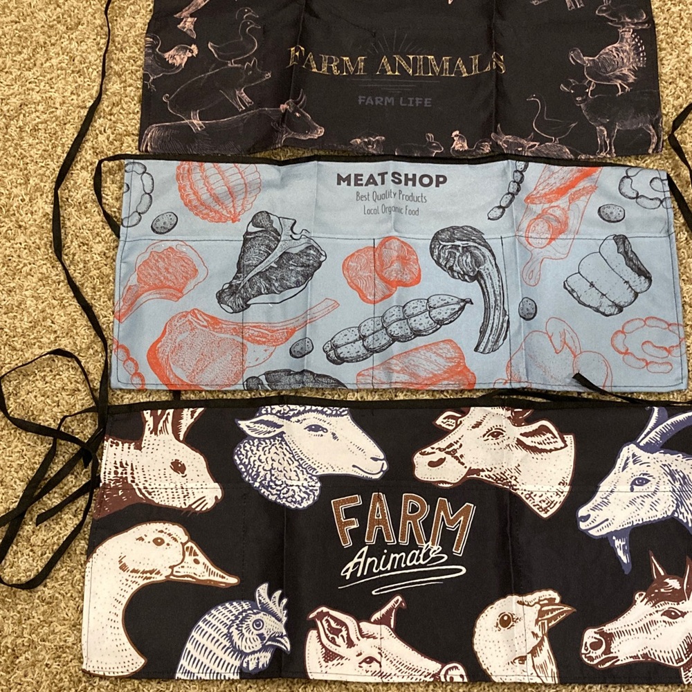 Three Animal Print Aprons - three front pockets.